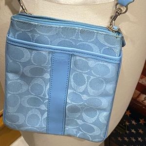 $5/$30 Little blue crossbody bag. Pick any five item mark 5/$30 and I accept